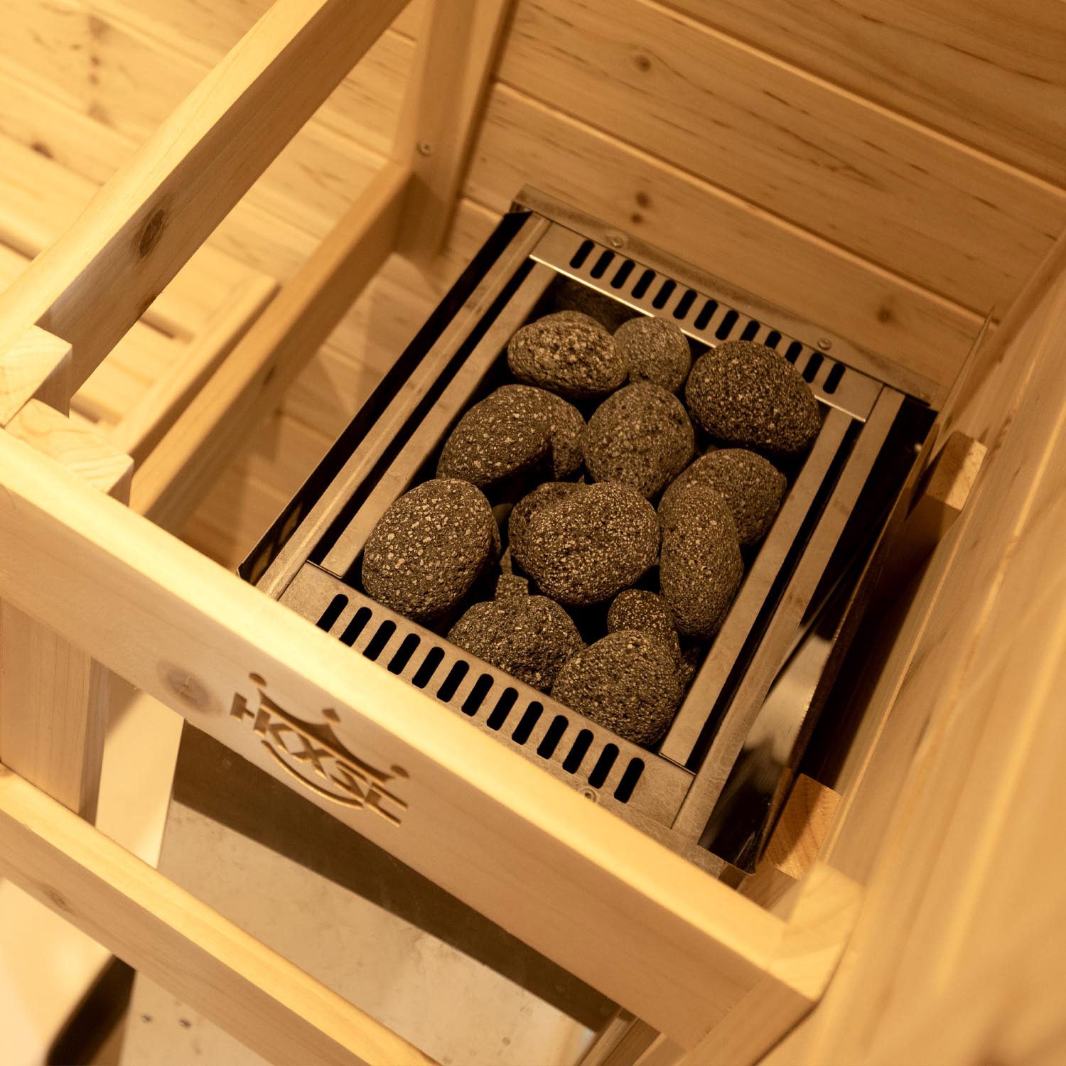 Porous round sauna stone, heated evenly, releases comfortable steam