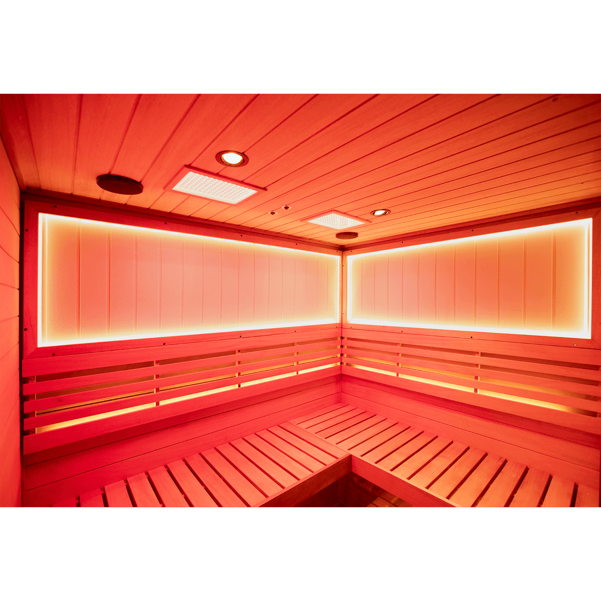 Side profile view of solid mahogany four‑person indoor home steam sauna unit