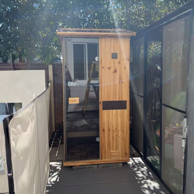 Dual-use wet heat and steam wooden sauna room with complete accessory package including weather protective cover, non-slip floor mat and sauna stone set, perfect for muscle soreness recovery after exercise