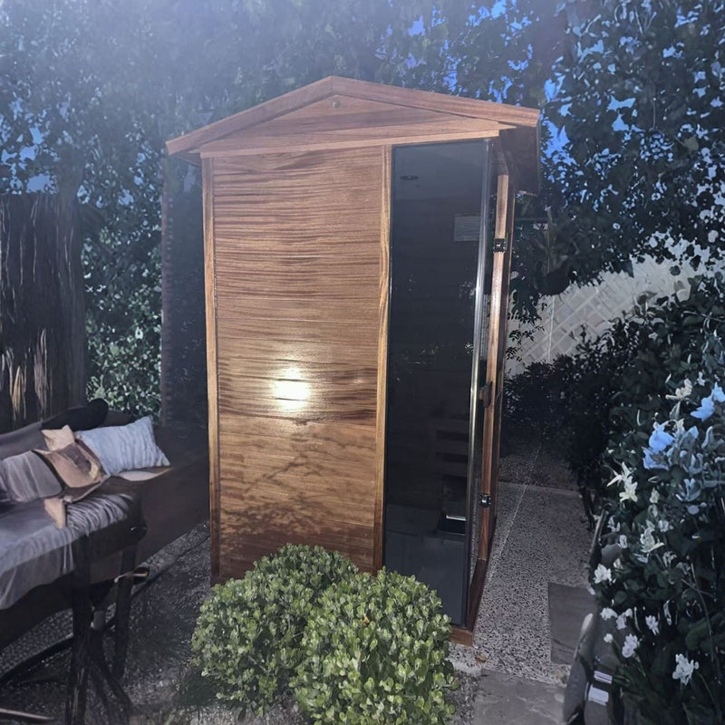 Spacious 1–2 person steam sauna with reinforced wooden frame, tempered glass door, dedicated drip tray under heater to catch residual water